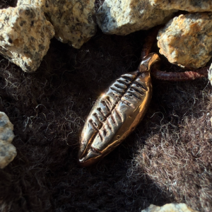 Brí ("strength") - with Ogham inscription - bronze
